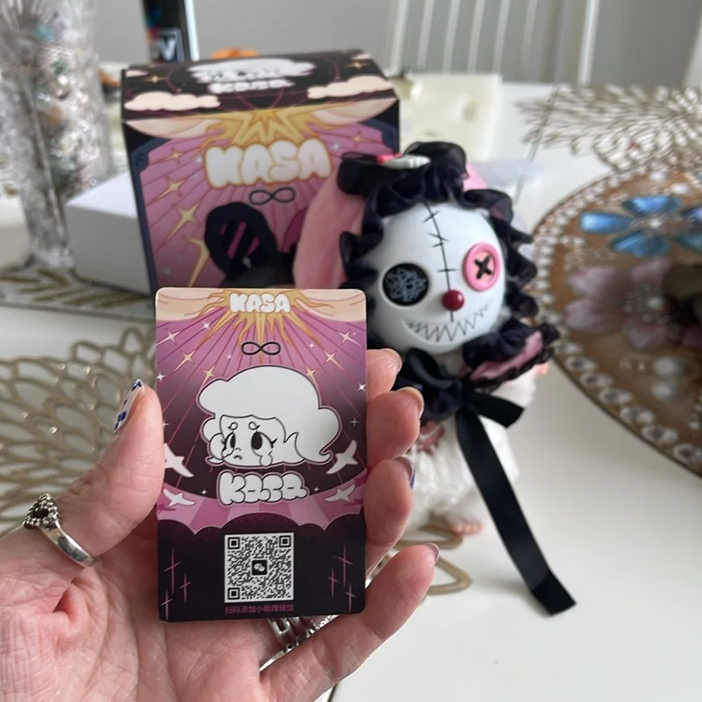Plush Doll with Pink Hood